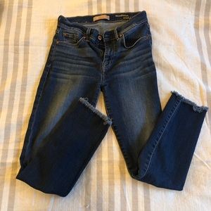 Distressed straight leg jean